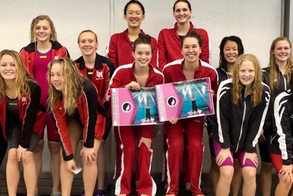 The relay of Carly Weigel 20, Olivia Masterson 20, Trinity Sadecky 20 and Rika Yahashiri 21 won the 200 medley relay at Regionals at Linn-Mar on Saturday.