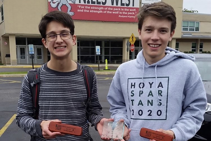 Ellis Chen 20 and Simon Weiss 20 pose after the tournament with their awards