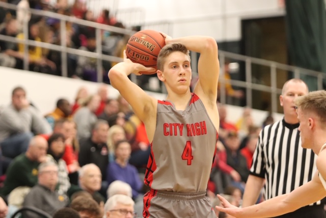 Kolby Kucera 21 looks for an open teammate to execute an inbound play. 