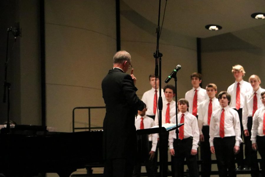 Dr. Grove directs the Little Hawk Singers choir at the choir departments winter concert.