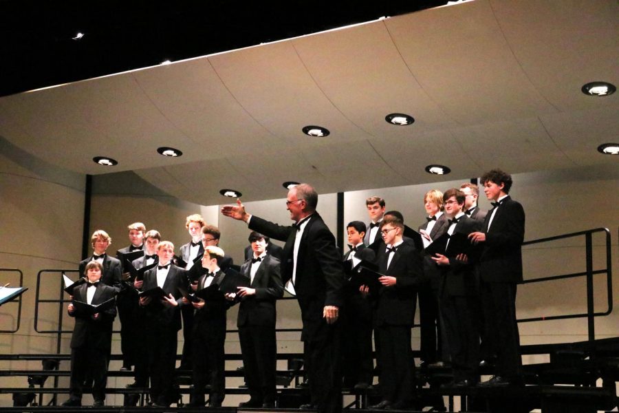 Dr. Grove bowing to crowd following a performance