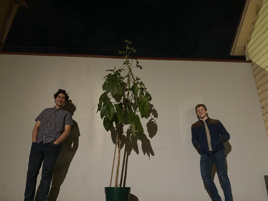 Oliver Bostian 21 (left) and Jeremiah Collins 21 (right) pose for a picture outside.