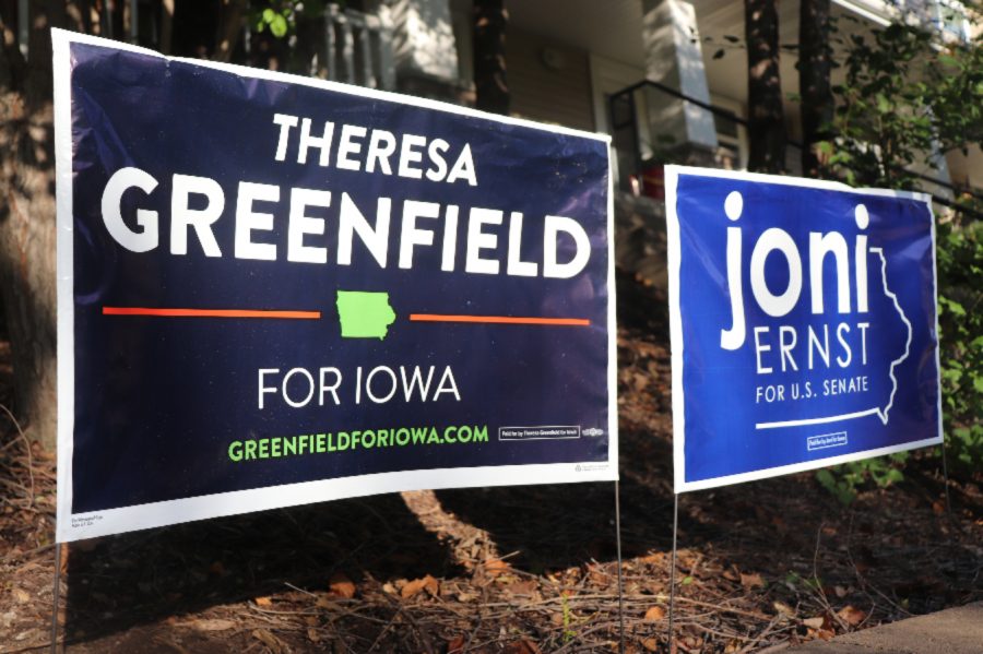 Signs for the Republican and Democratic Nominee for Iowa Senate.