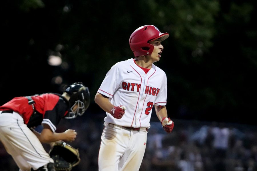 Garrett Boremann 20 scores to help City defeat Linn-Mar. After scoring a last-minute run, City defeated Linn-Mar 4-3 to move on to the State Tournament. 