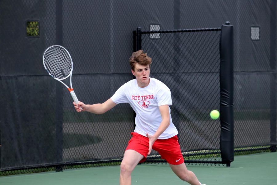 Malachi Nye 22 warms up in preparation for his match against Waterloo West.