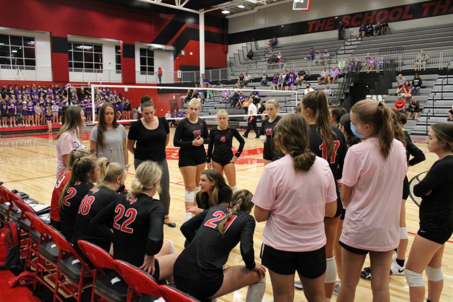 Head Coach Tricia Carty encourages the team during a timeout at the game against Liberty High.
