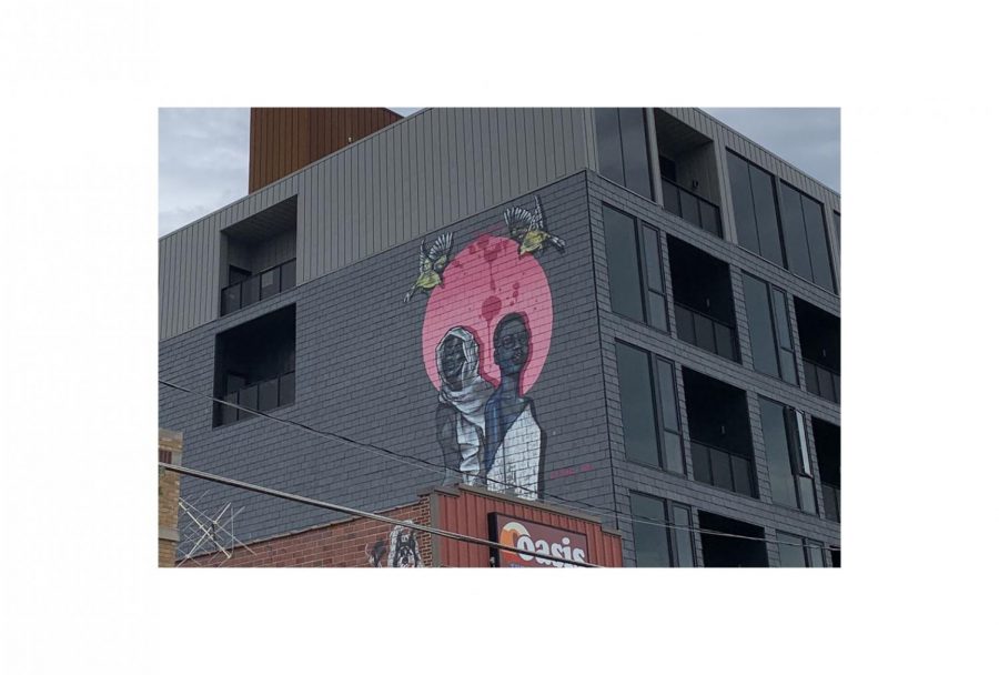 Found on 202 N. Linn Street, this mural was painted in June of 2020 by artists Robert Moore and Dana Harrison. “There’s a lot of Black humans and community figures in Iowa City that I wanted to elevate,” Moore told the Daily Iowan.
