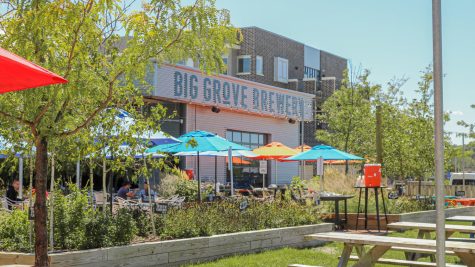 Customers eat in Big Groves Brewery patio area.