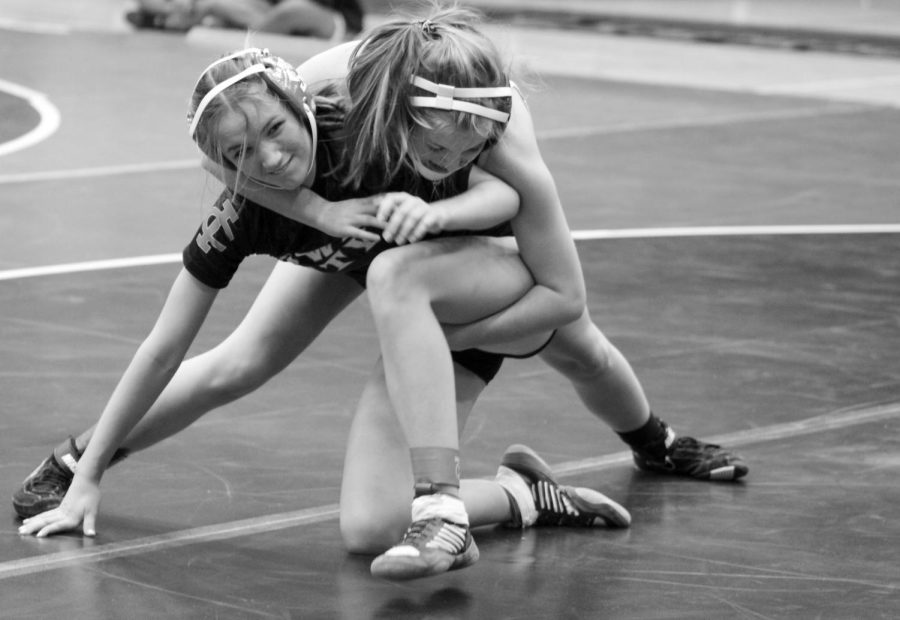 Sydney Wilkes 23 escapes from her opponent to pin her.