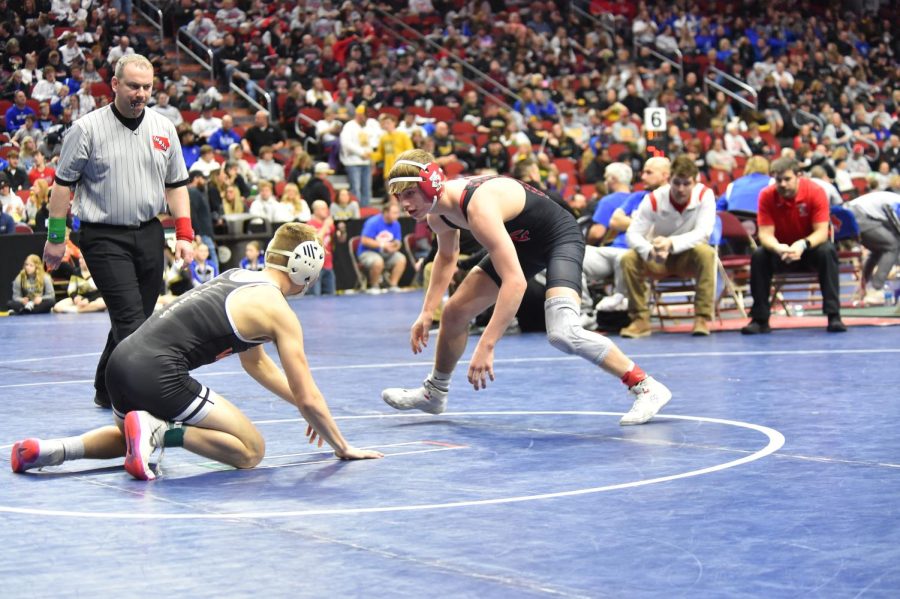 Cale+Seaton+%E2%80%9824+takes+on+his+opponent+at+the+state+wrestling+tournament+in+February+2022.