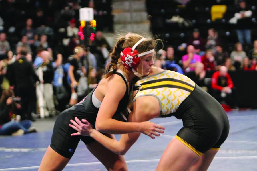 Claire Brown 23 wrestles at the state tournament at XStream Arena, representing the City High Girls Wrestling Team, in its first year of competing.