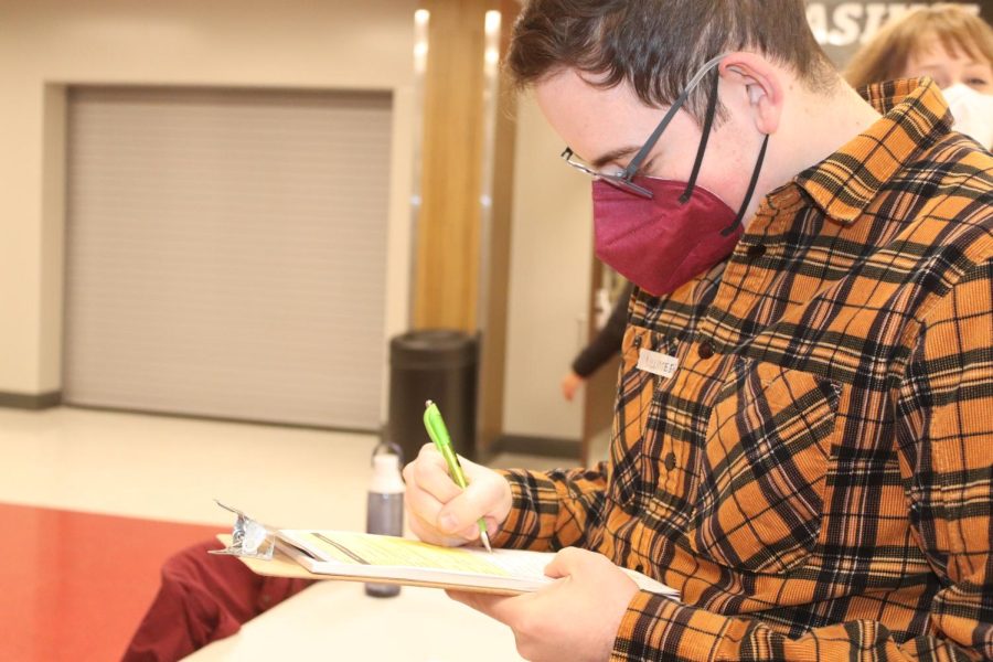 Adam Zabner registers City High students to vote.