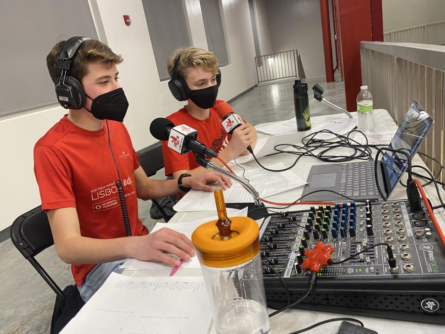 Parker Max and Jack Degner live stream a City High basketball game.  Two LH journalists that helped create content that helped the Little Hawk journalism team earn the Pacemaker Finalist award.