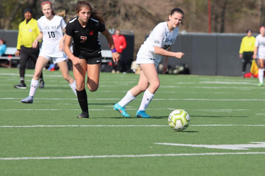 Claire Brown 23 chases after the ball in Citys game against Linn-Mar