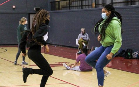 Kaliyah Davis 25(left) and Dajah Malone 25(right) jump in unsion during a double dutch meeting