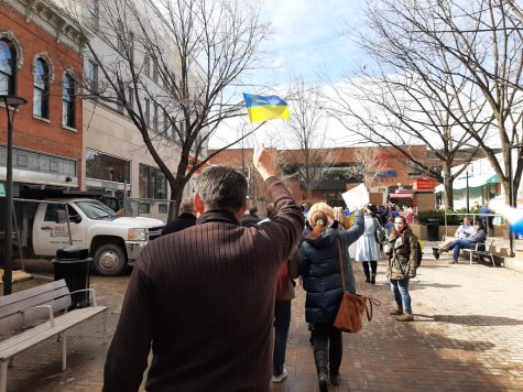 Iowa City residents march to the Old Capitol in support of Ukraine.