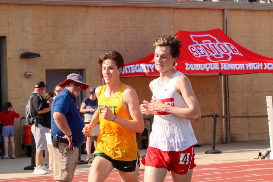 Ford Washburn '22 and West High runner Alex McKane finish the race together qualifying for state