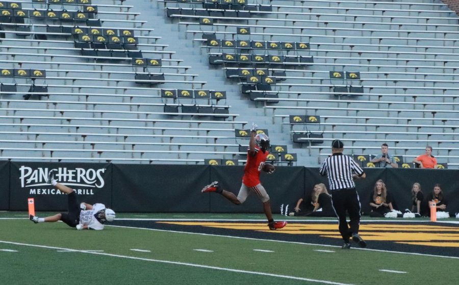 KP scores a touchdown against Liberty at Kinnick Stadium.