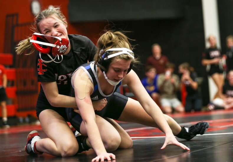 City+Highs+Sydney+Wilkes+Headgear+is+thrown+off+her+head+as+she+starts+the+last+period+on+top+during+City+Highs+only+home+womens+wrestling+meet+last+year.