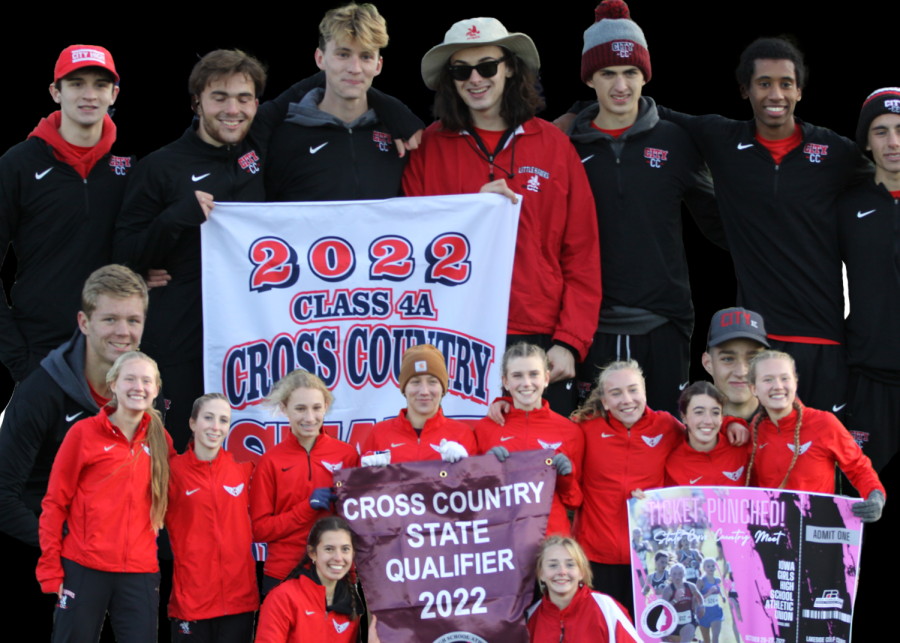 Both the boys and girls varsity teams hold up their state qualifier flags.