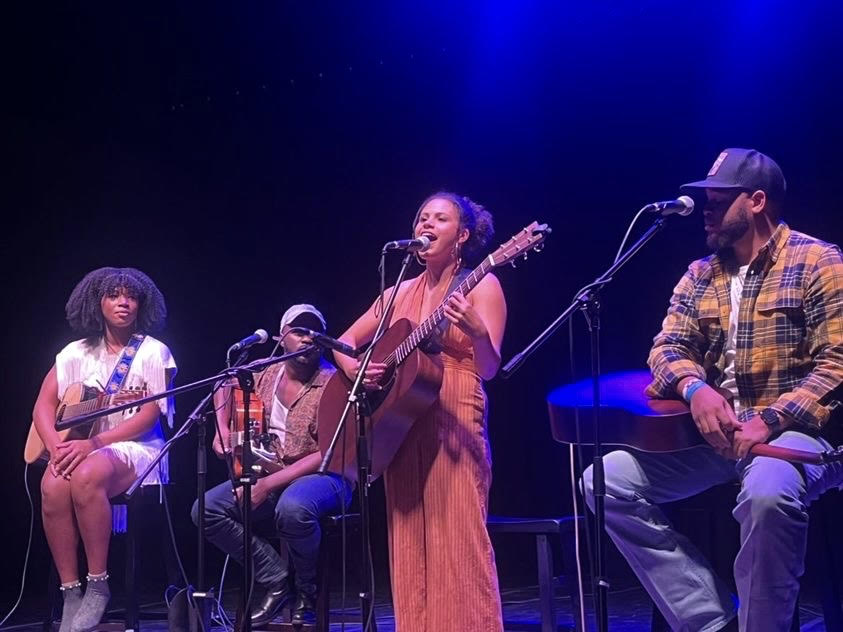 Julie Williams performing at The James Theatre, alongside The Black Opry