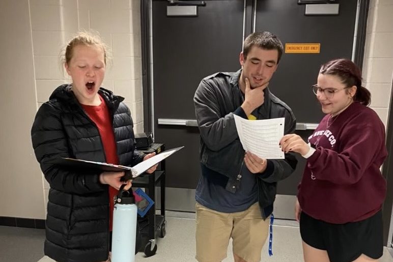 Avery Provorse ‘24, Rigby Templeman ‘23, and Norah Mettemeyer ‘24 practice for musical theater for speech