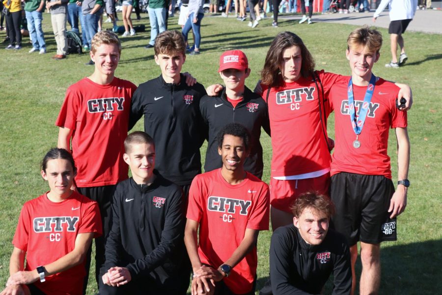 The City High Boys team poses for a picture after their last race of the season