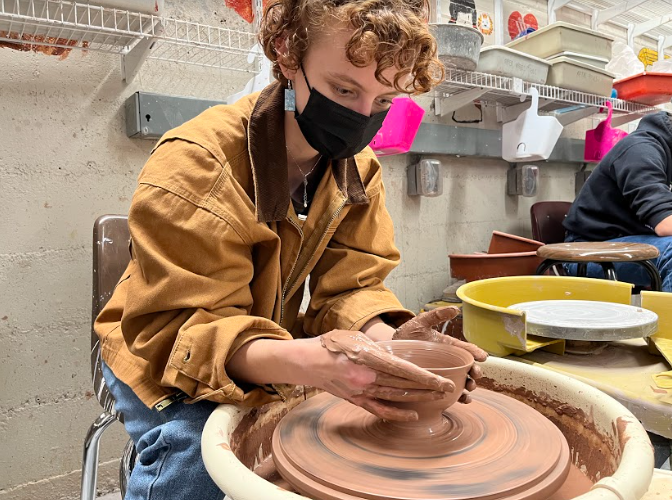 Maya+Bennett+%E2%80%9823+can+often+be+found+working+on+a+new+project+on+one+of+the+pottery+wheels+in+the+art+room+during+her+spare+time