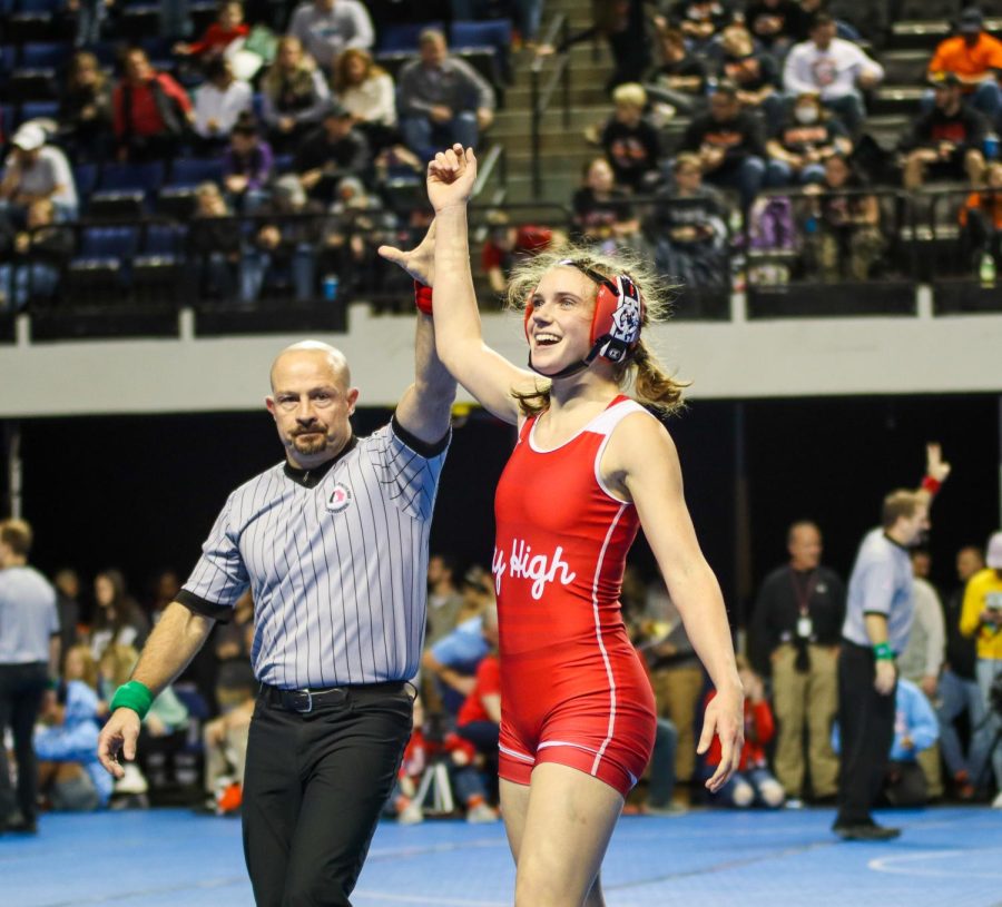 Erin Anderson 23 smiles after pinning her opponent to go through for finals.