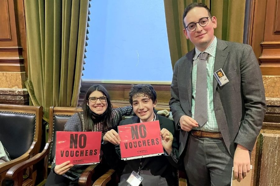 City Alumni and state representative Adam Zabner poses with Matisse Arnone 23 and Lulu Roarick 24 after protesting the voucher bill.