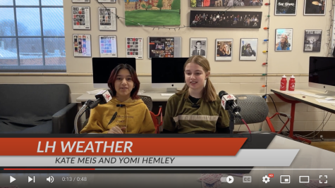 Kate Meis and Yomi Hemley deliver the weather report from room 2109 at City High.