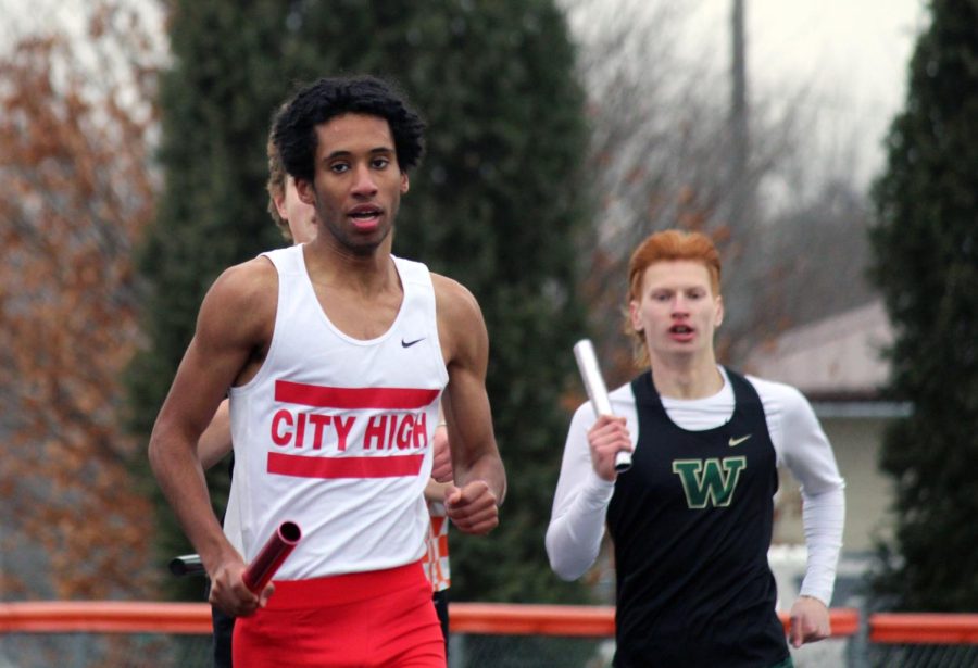 Ayman Norldaim leads off the 4x800 meter relay for the Little Hawks