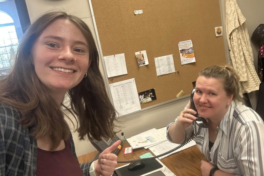 Molly Savage and Mrs. Stucky-Swanson pose in her office.