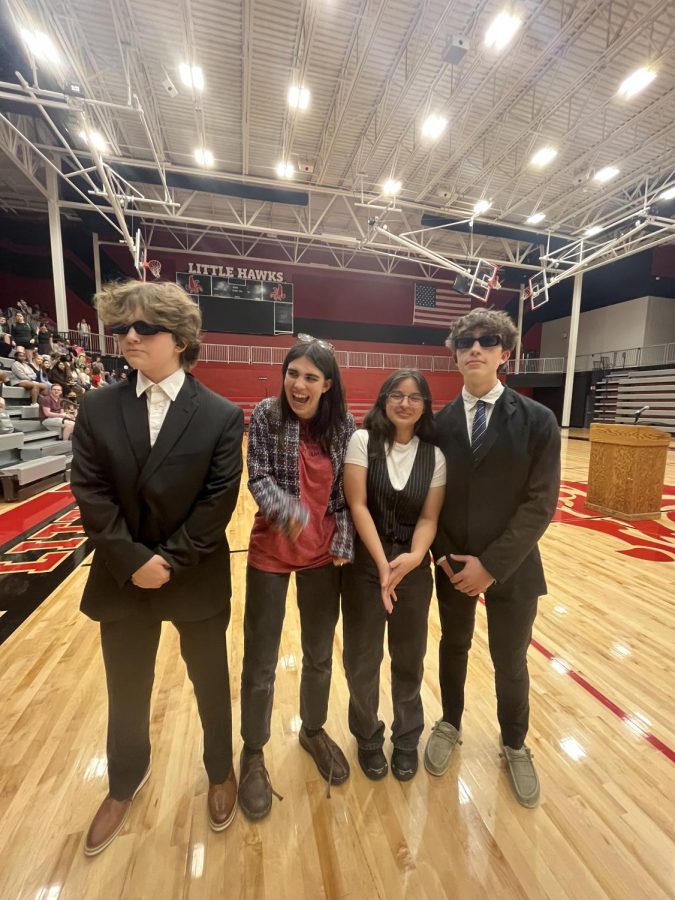 Rose Florez-Rubio and Lulu Roarick with their bodyguards, Joe Fullenkamp and Diego Loria-Eivins