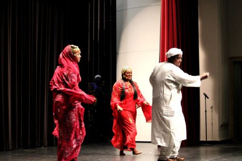 Morwan Ali 23, Miamen Elawad 25, and Fatima Musa 23 dance to a Sudanese song