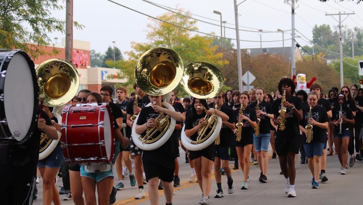City High Marching Band leads the Homecoming Parade down 4th Avenue