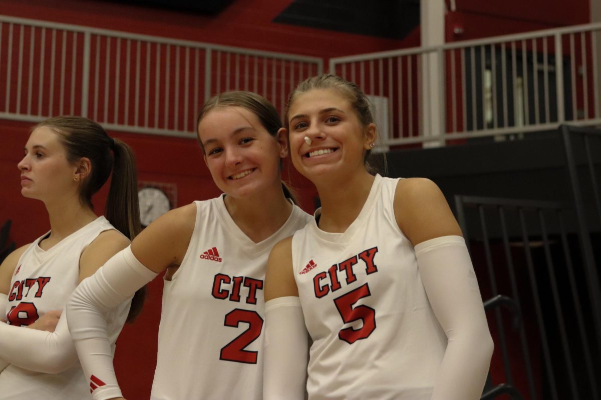 Haleigh Nelson 24 and Liv Neuzil 24, giving positive vibes during game