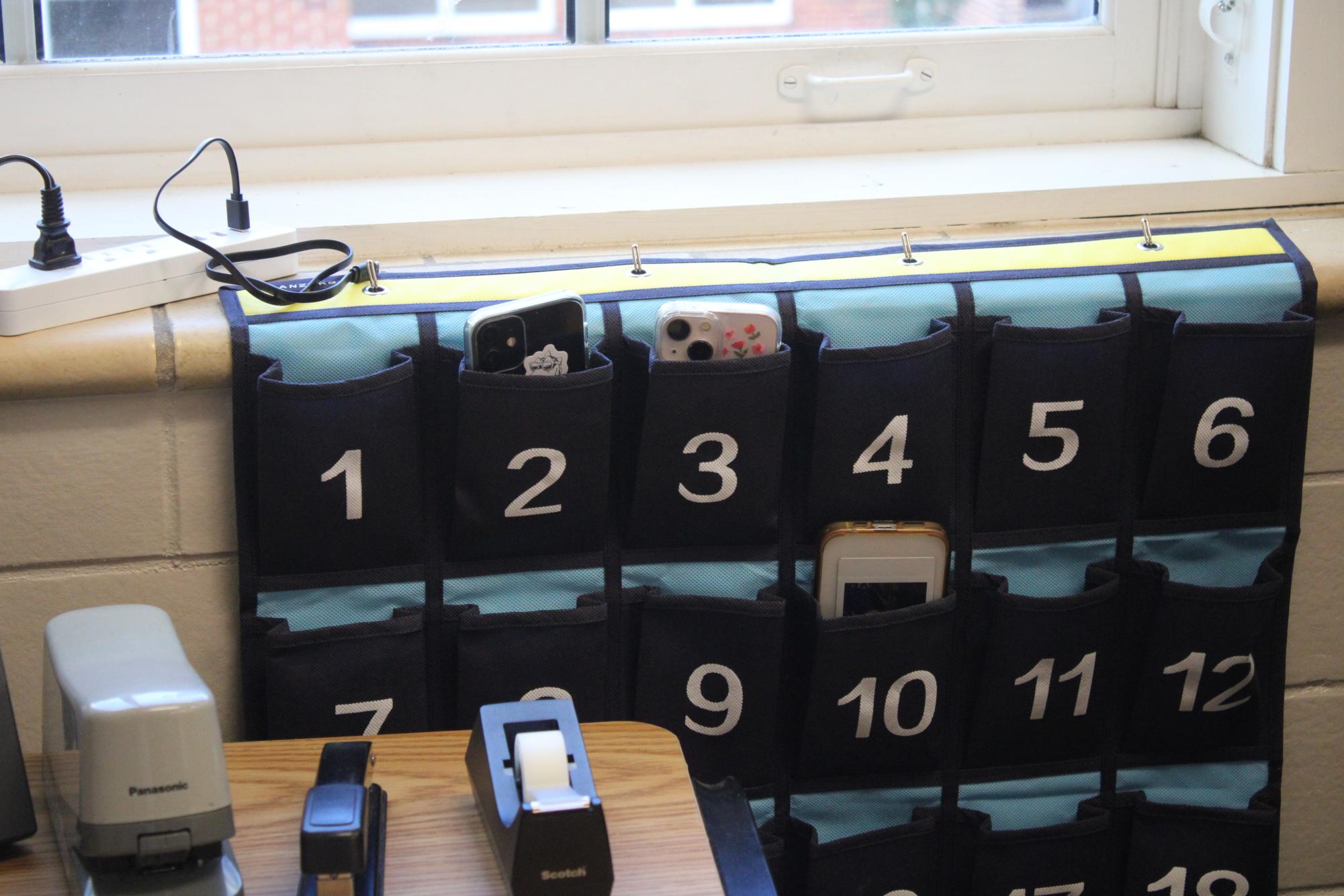 Every classroom has phone pockets for students to stow their phones