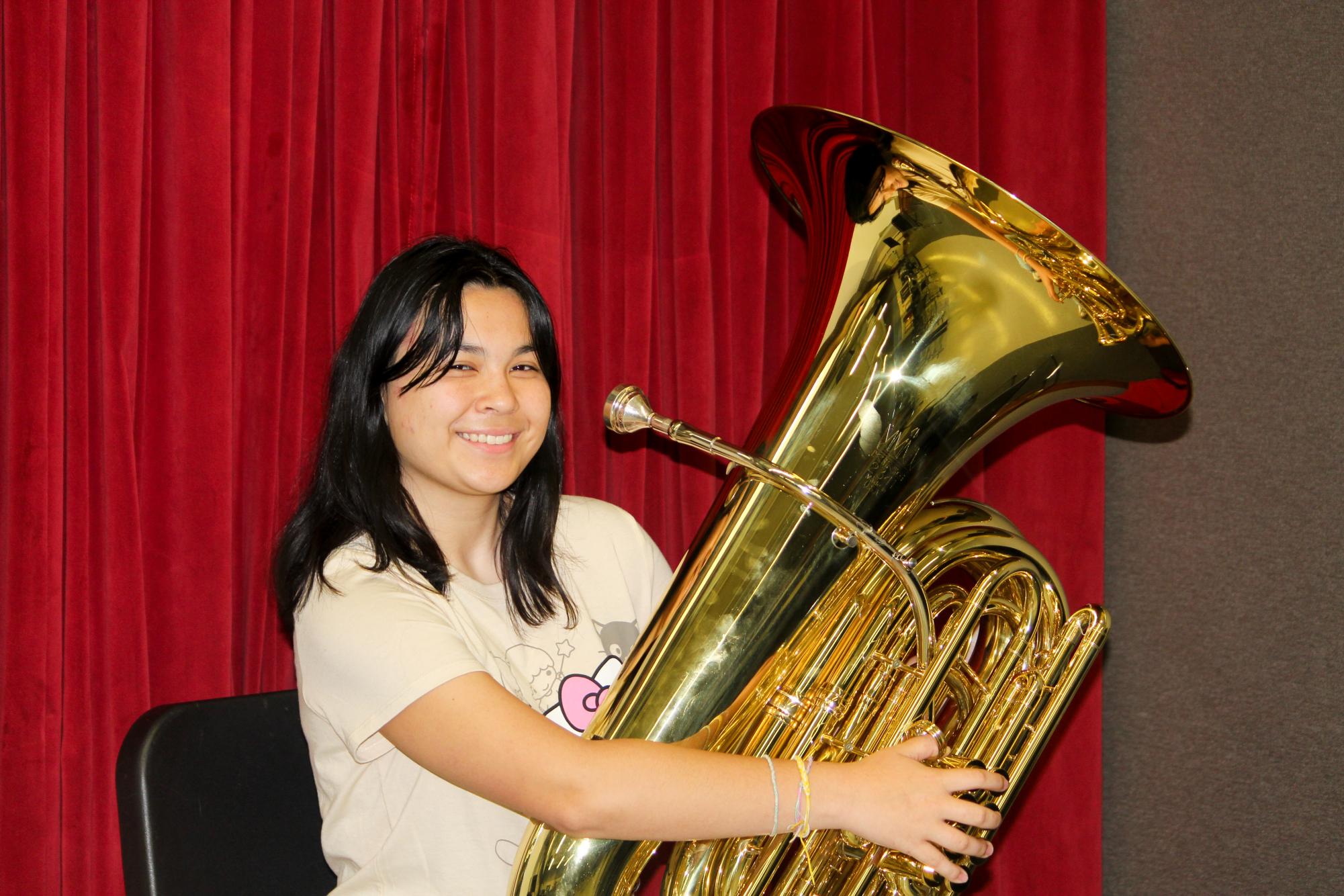 Poi Borchardt 26 plays the double B flat tuba, which is the most common model in concert bands