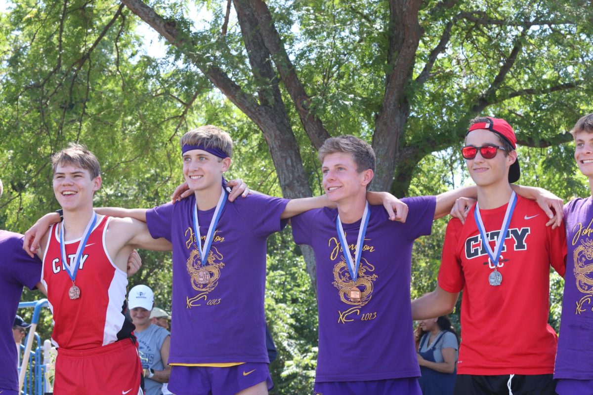 George Karr 25 and Adam Schaefer 25 smile for a picture during the awards ceremony.