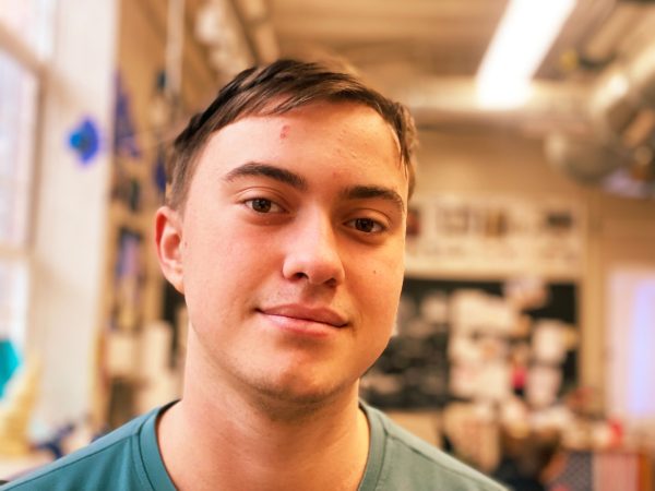 James Meggitt, 23, in the art room after designing his paintball helmet