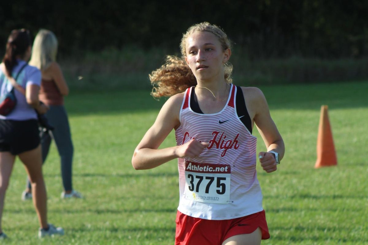 Abigail Burns 26 competes in a meet during the Cross Country season