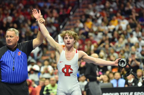 Cale Seaton 24 holds up hand in victory after winning state