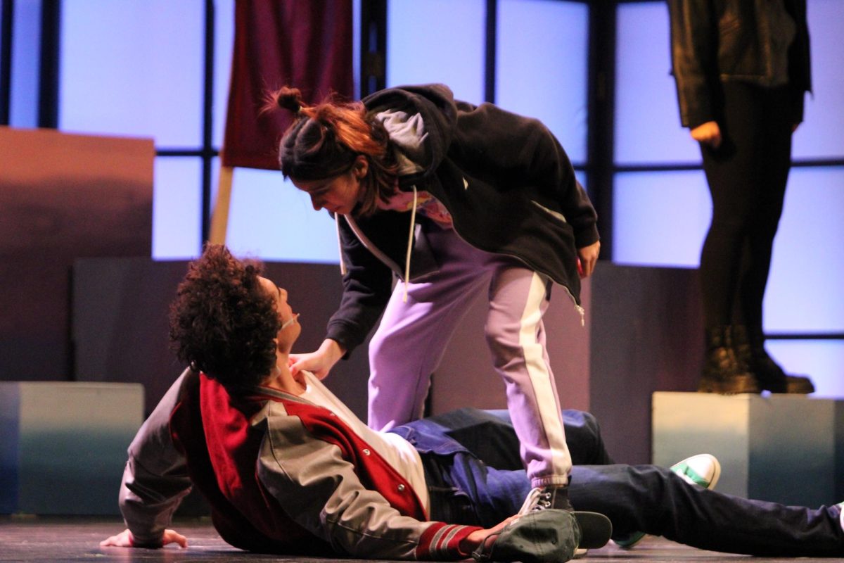 Emi Edwards played by Yomi Hemley ‘25 beats up DJ MC played by Brody Clarke ‘25 in the fall play, ‘Begets’