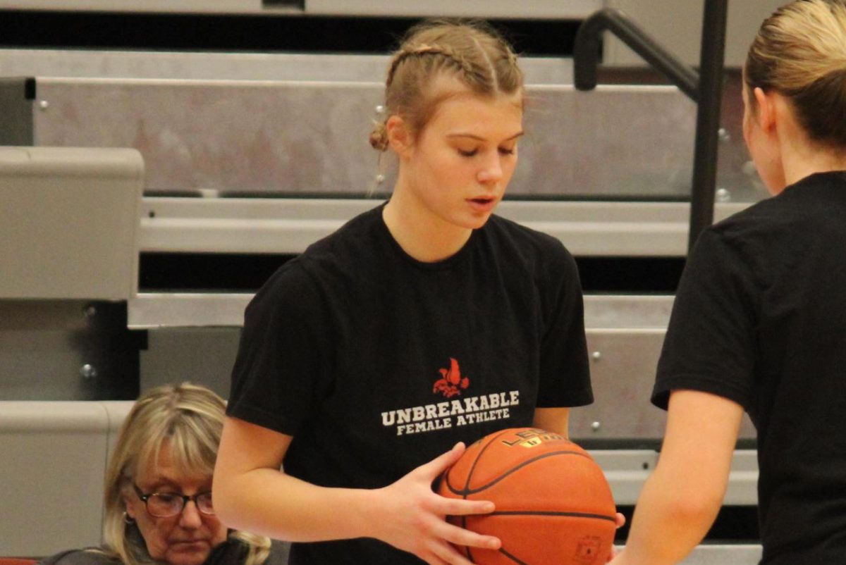 August Palmer 25 warms up before the UFA game at City High