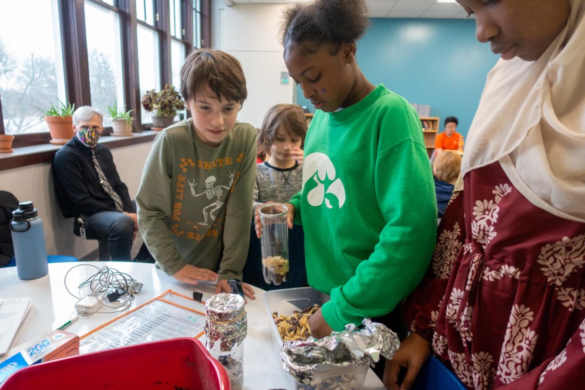 Horace+Mann+sixth+grade+students+do+a+hands-on+composting+project+during+a+presentation+by+City+High+Environmental+Club.