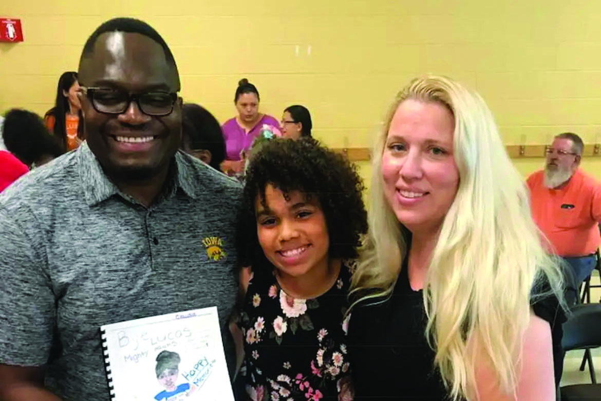 Claudia Lusala ‘24 with her Congolese dad and white mom. Photo courtesy of Lusala