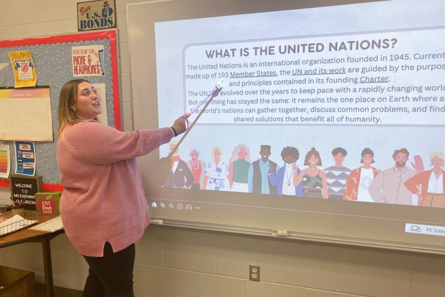 Ms. Eastman presents to students at a Model UN meeting