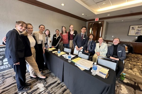 City Mock Trial’s Junior Team takes a group picture before their final round, fighting as the Prosecution side. Photo courtesy of Brody Clarke