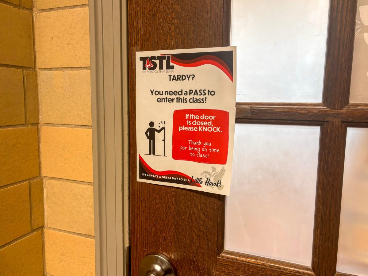 Policy signs are posted for students on classroom doors
